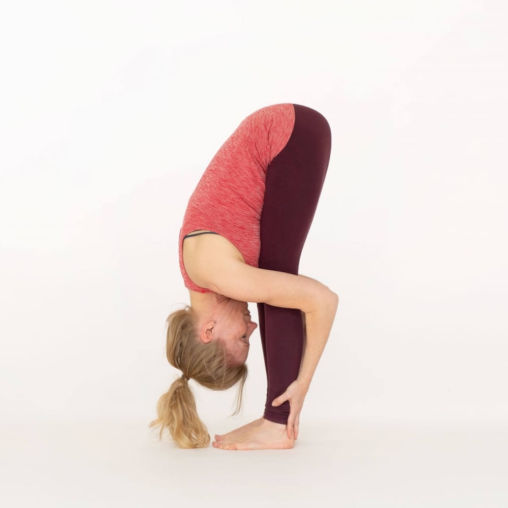 Standing Forward Bend-Uttanasana-Ekhart Yoga | Ekhart Yoga